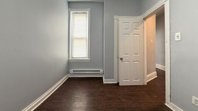 Building Photo - Updated 3 Bedroom 1.5 Bath Townhome w/ Paved Yard + Washer & Dryer