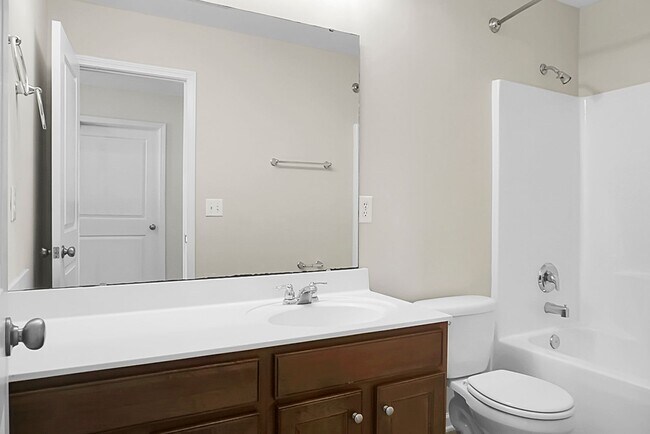 Building Photo - Comfortable Living, 4 BR 2.5 BA Home, Two Car Garage
