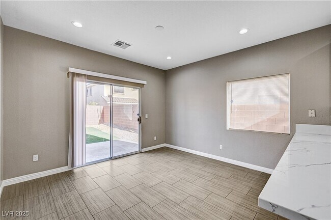 Building Photo - 9110 Rushing Wind Ave