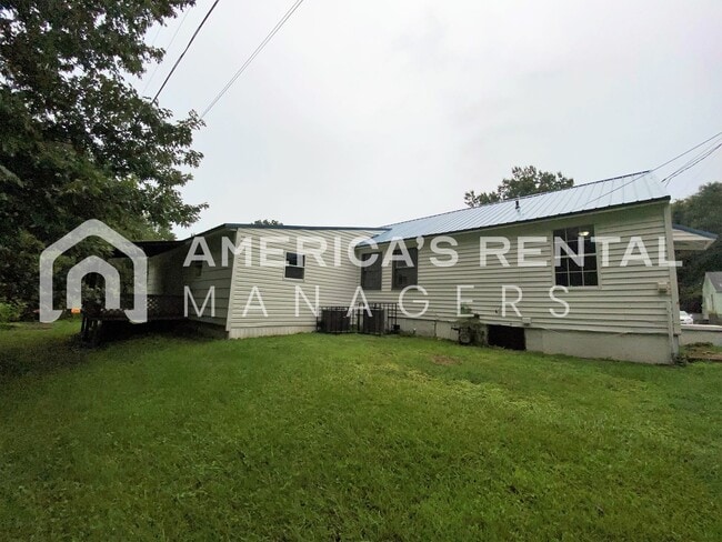 Building Photo - 104/105 7th Ave SE