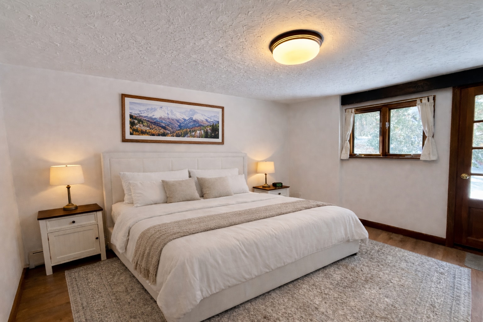 King bed in primary bedroom - 111 North Rd