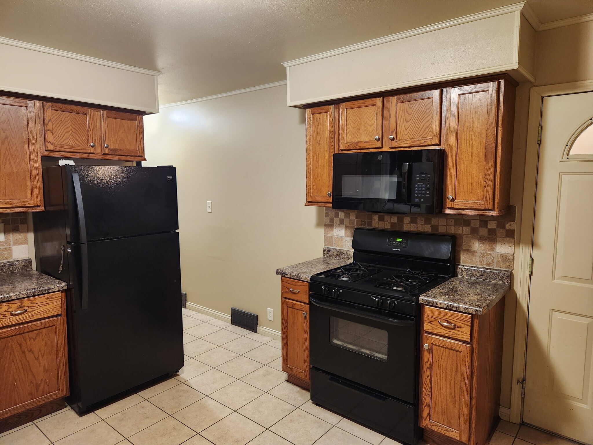 Kitchen (fridge, stove, and microwave included) - 510 S 72nd St