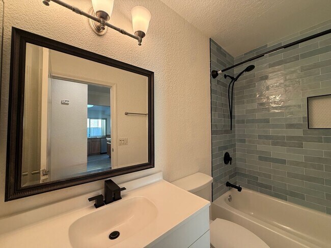 Building Photo - Charming 2-Bed/2-Bath Condo in Gated Forest Glen Community