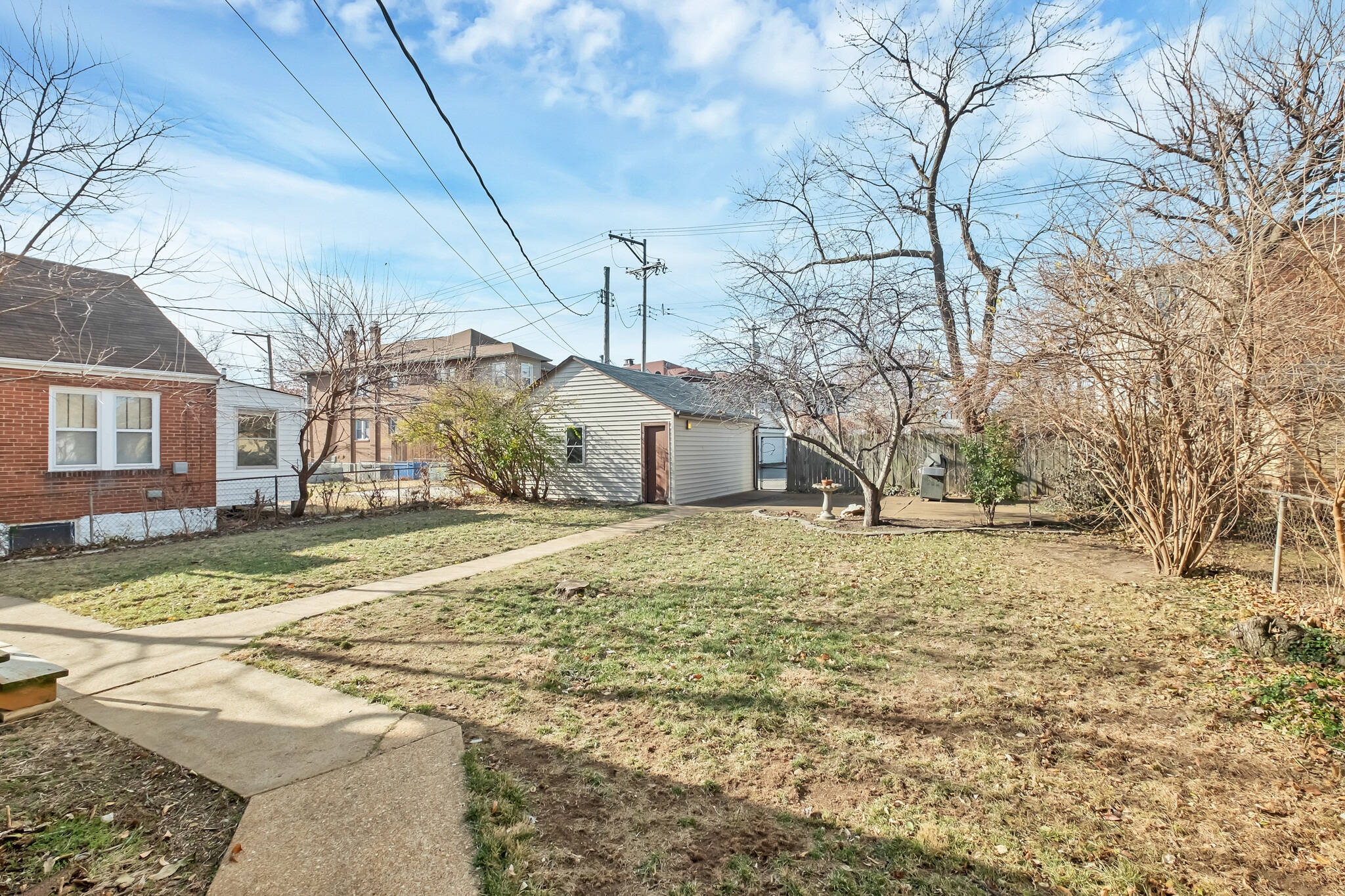 Winter view of double lot and garage - 3443 Lawn Ave