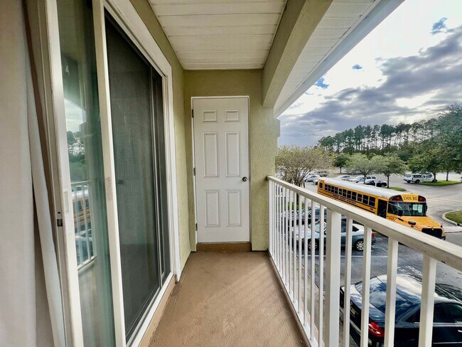 Building Photo - Gated Comfort Condo, Poolside Vibes: Your Next Home Awaits at Merrill Pines