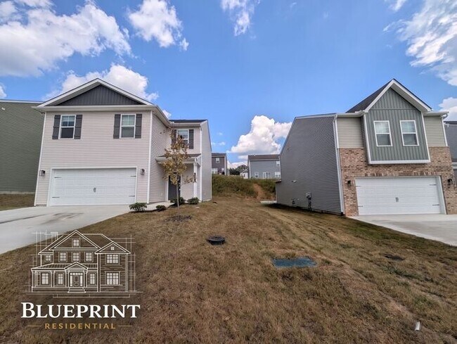 Building Photo - 2024 build, great neighborhood, stainless appliances, granite countertops!