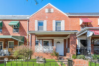 Building Photo - Charming Brick Townhome with Finished Base...