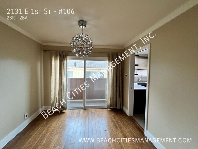 Building Photo - Condo located One Block from the Beach wit...