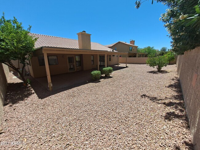 Building Photo - 9074 E Caribbean Ln