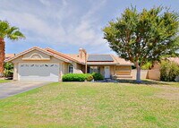 Building Photo - "Charming Oasis: 3-Bedroom Cathedral City Retreat with Pool, Fireplace, and Granite Kitchen!"