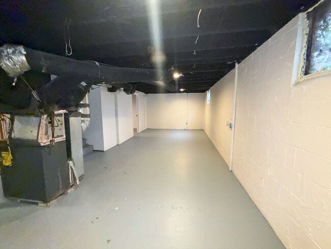 Building Photo - Move-In Ready 2BR Home w/ Refinished Hardwood Floors + Bonus Room Basement!