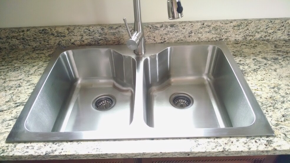 Double Stainless Steel sink with High arch faucet - 1 E. Main St.