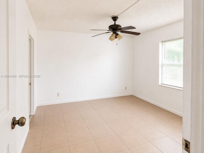 Building Photo - 8750 Royal Palm Blvd