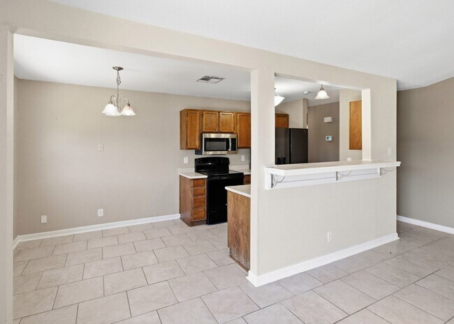 Building Photo - Corner-Lot Garden Home with Fireplace and Private Patio