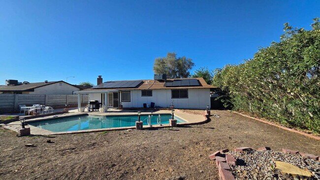 Building Photo - Beautifully remodeled pool home situated on a spacious quarter-acre lot