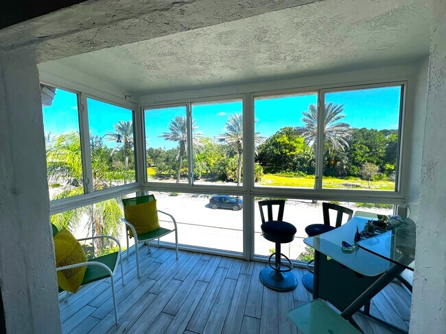 Building Photo - 708 S Tamiami Trl