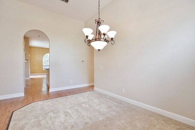 Building Photo - Stunning 4/3 Pool Home with a Bonus Room a...