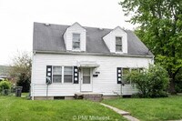 Building Photo - "Charming 2-Bedroom Duplex with Gleaming Hardwood Floors in Indy!"