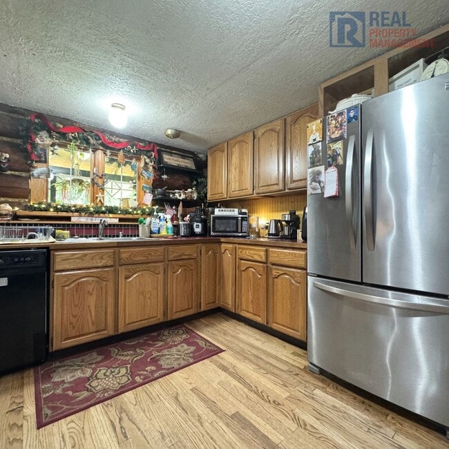 Building Photo - Lynch - 6005 (Olympic group - ADV only)
