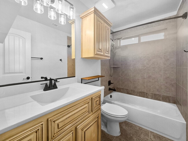 Building Photo - Immaculate 4-Bedroom Home with Luxury Upgr...