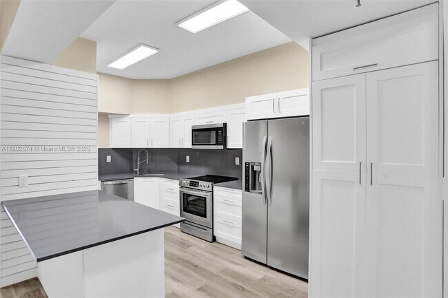 Building Photo - 8816 Collins Ave