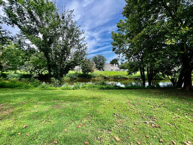Building Photo - Charming single family home on peaceful canal