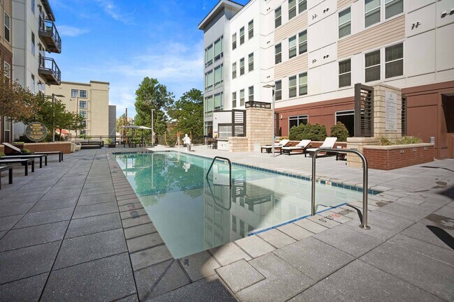 Dive into relaxation and enjoy resort-style living at our sparkling pool. - Centric LoHi by Windsor