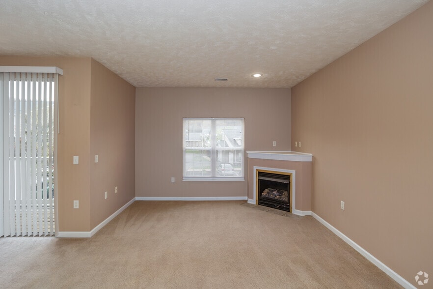 2BR, 2BA - 1,281SF - Living Room - Units within Foxmoor Condominiums