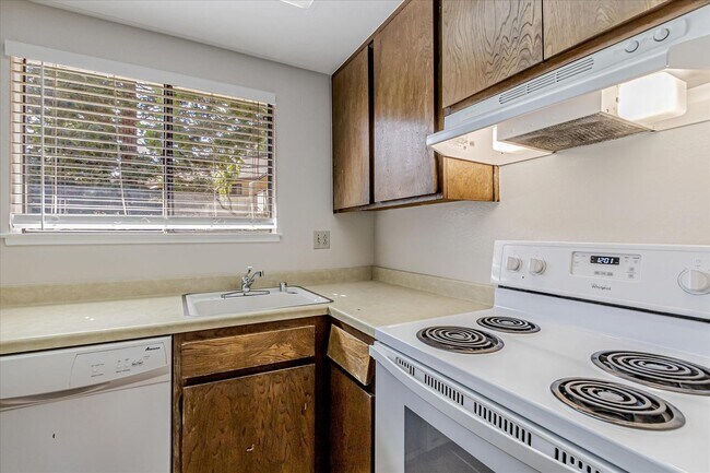 Building Photo - Stylish End-Unit Condo l Private Patio l Community Pool