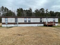 Building Photo - 2 BDRM 1.5 BA SINGLEWIDE MOBILE HOME IN PARK LOCATED IN ROBBINS