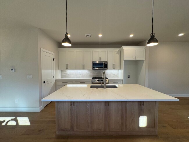 Building Photo - BRAND NEW - 4 bed - 3 bath - 2 car with fenced yard!