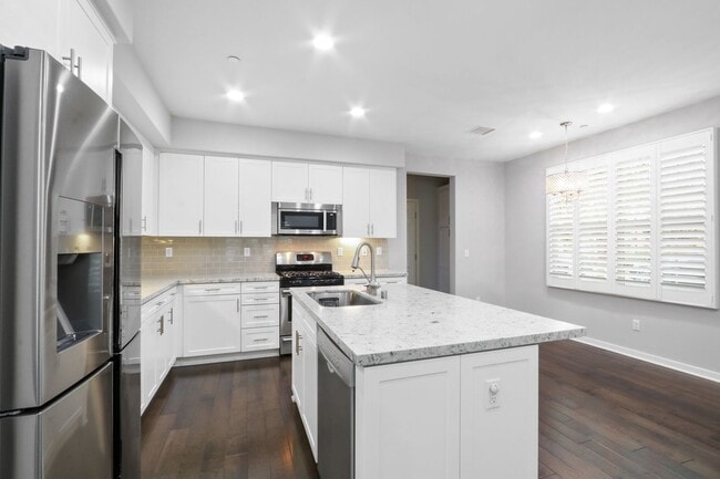 Building Photo - For Lease – 4 Bed / 3 Bath Townhome with 2-Car Garage