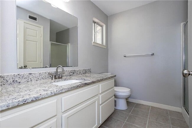 Building Photo - Stunning Renovation - New Hardwood flooring, tile in Kitchen. Granite countertops, breakfast bar