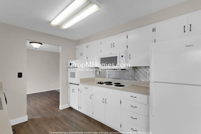 Building Photo - Updated Four Bedroom Home w/ Huge Yard!