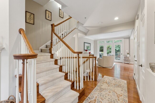 Building Photo - Discover this stunning four-level townhous...