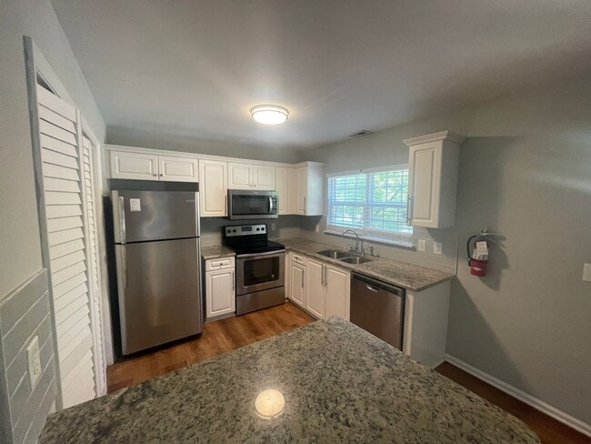 Building Photo - MOVE IN SPECIAL $500 Security Deposit, 1/2 off a month's rent with approved Credit background UNC...