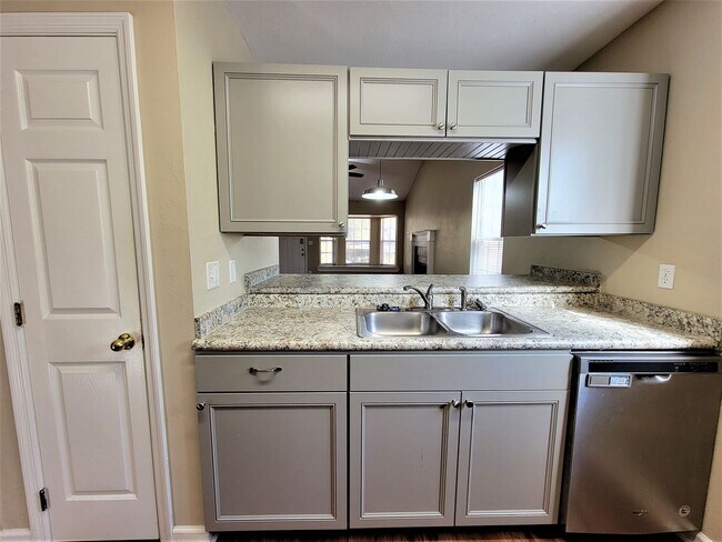 Building Photo - 2 bedroom duplex for rent right away off E Mahan, wood floors and fireplace for $1450 per month