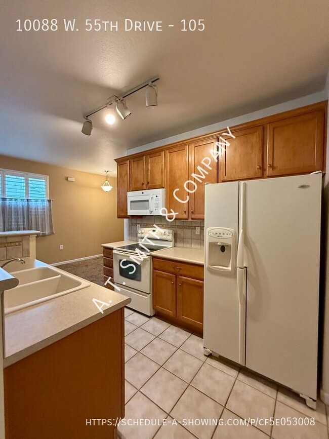 Building Photo - 10088 W 55th Dr