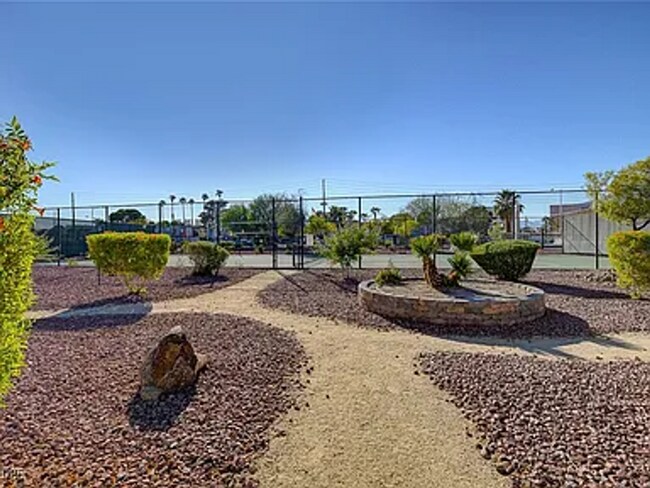 Building Photo - Enjoy resort-style living in this 2 Bed 2 Bath Condo with Stunning Strip Views in the Wimbledon C...