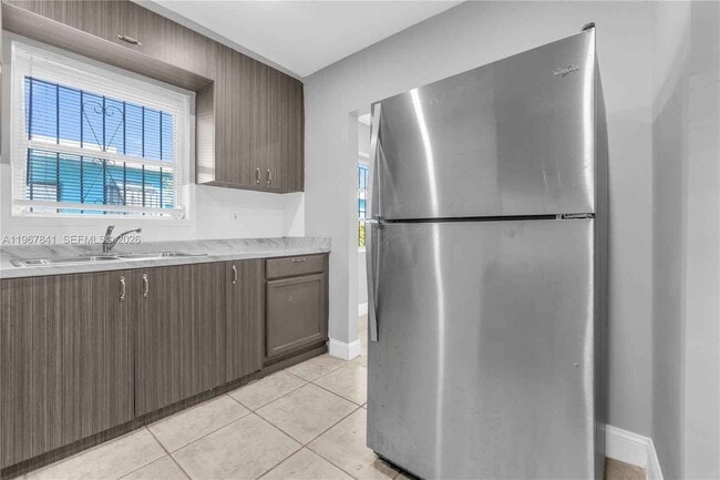 Building Photo - 6940 NW 6th Ct