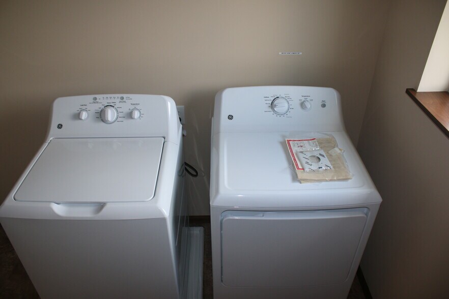 Upstairs laundry - 5178 Foxfield Dr NW