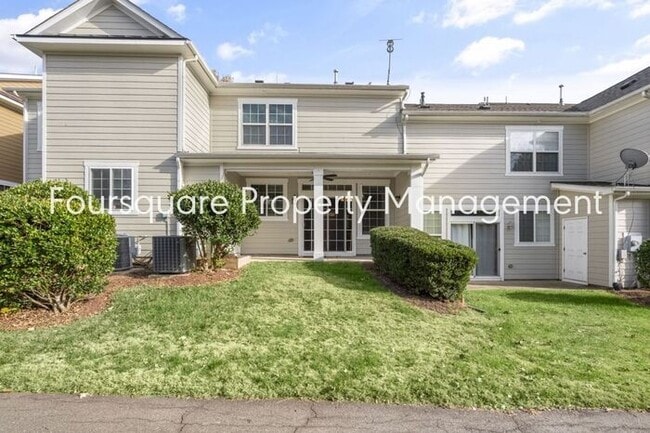 Building Photo - Charming Townhome with Open Layout, Back Patio & One-Car Garage – Near RTP, RDU & Everyday Conven...