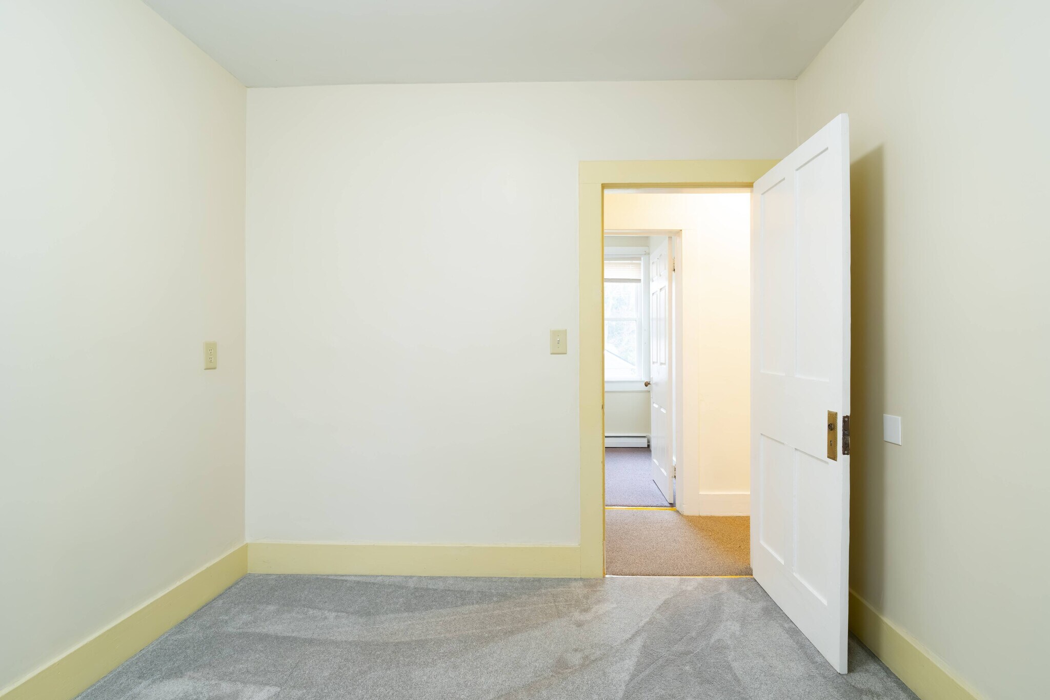 Rear Bedroom looking towards Bonus Room - 100 N Main St