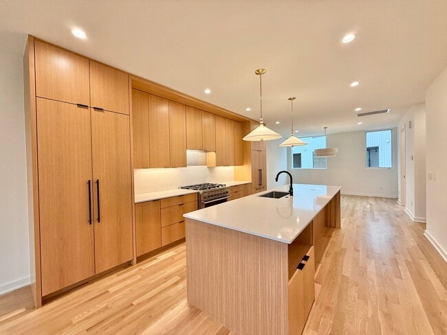 Building Photo - Luxurious New Construction 4BD, 2.5BA Raleigh Townhome with a Rooftop Terrace in a Prime Location...