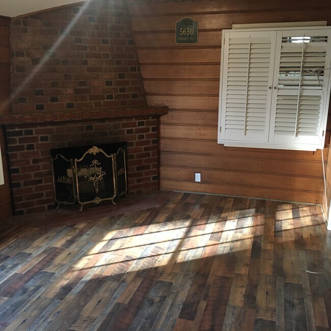bedroom w fireplace - 5650 Rhodes Ave