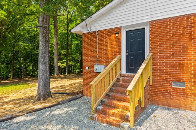 Building Photo - Renovated Brick Ranch with Nature Views + Close to Everything Fort Mill Offers 3 Bedrooms | 1 Bat...