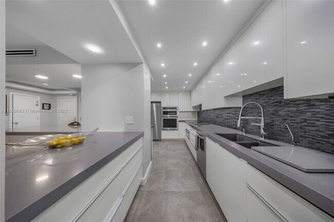 Building Photo - 9801 Collins Ave