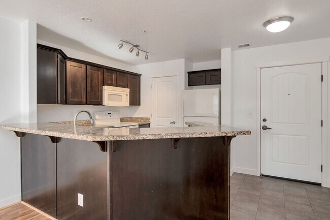 Building Photo - Stunning Midvale Condo in Secure Building w internet