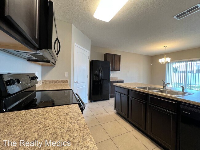 Building Photo - 4 br, 2 bath House - 1665 Laurel Oaks Dr