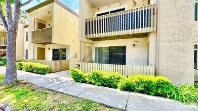 Building Photo - Light, Bright, and Lovely Ground Level Con...